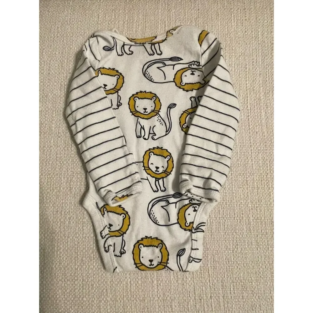 Carter’s Bundle of  4 (four) Preemie / newborn onesies.